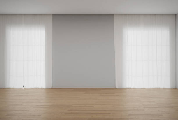 istock Empty white wall with window and wooden floor. 1794621580