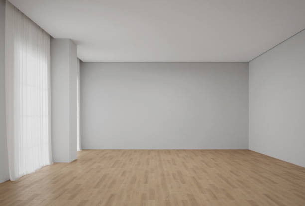 istock Empty white wall with window and wooden floor. 1794622106