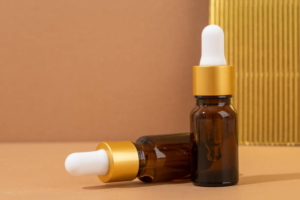 istock minimal composition of amber glass dropper bottles 1794622107