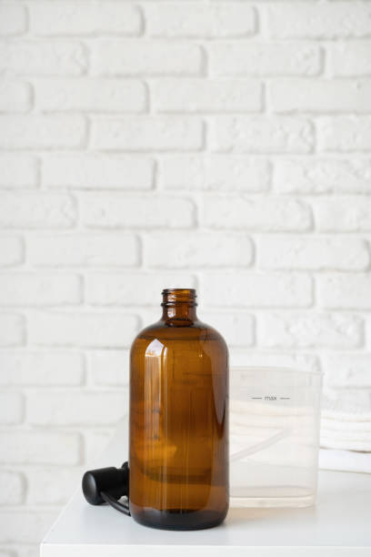 istock Recycled plastic pump bottle for mockup on white brick wall background 1794625444