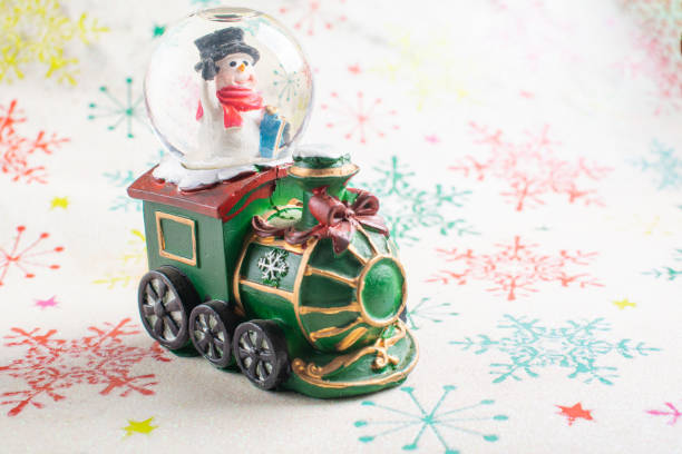 istock Christmas ornaments, beautiful Christmas decorations on light surface with snowflake designs, selective focus 1794644239