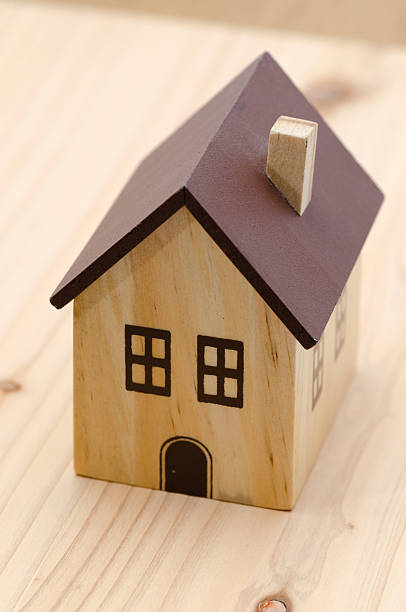 istock Toy house on the board 179464825