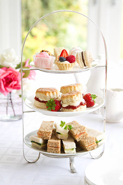 Afternoon tea Traditional afternoon tea served with scones scone photos stock pictures, royalty-free photos & images