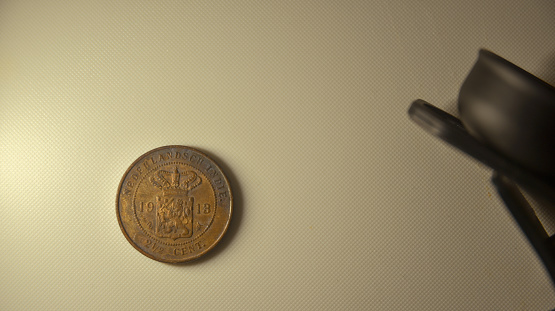 1913 2.5 cent benggol coin.
