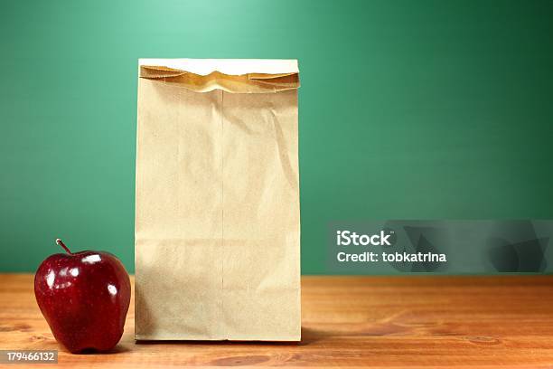 Copy Space Lunch Sack Sitting On Teacher Desk Stock Photo - Download Image Now - Apple - Fruit, Arrangement, Back to School