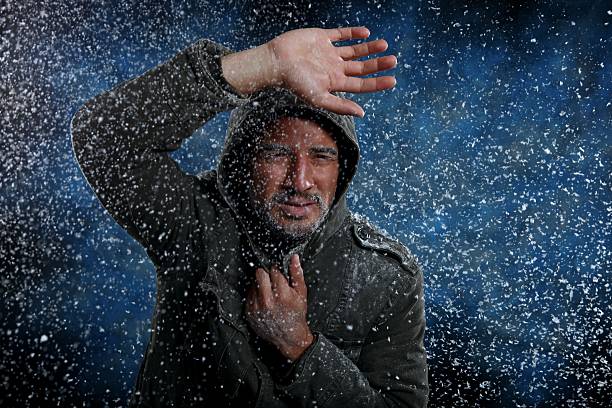 istock Struggling Man Freezing in Cold Weather 179466204