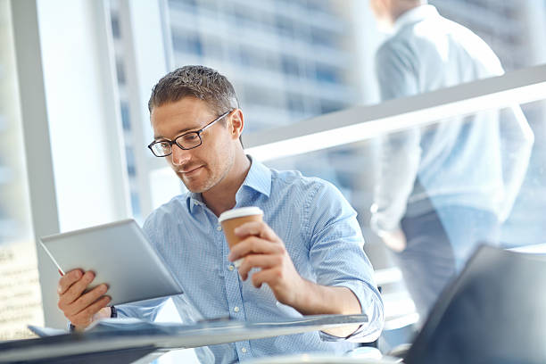istock Keeping his eyes open for great online investments 179467063