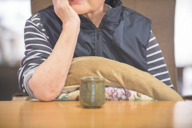An elderly woman who is worried