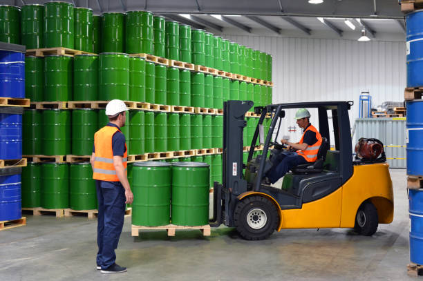 istock group of workers in the logistics industry work in a warehouse with chemicals 1794686852