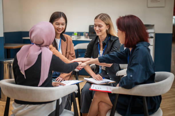 istock Collective Triumph: Multifaceted Businesswomen Celebrating Unity in Co-Working Ventures 1794701828