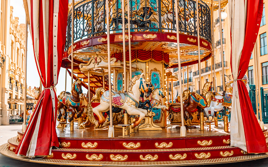 Chain carousel, beer hall, shooting gallery, food truck, at an Beer Fest in Upper Bavaria, Germany.