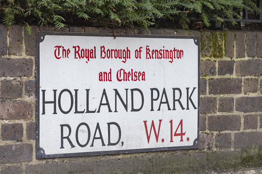 street name sign on Holland Park Road in The Royal Borough of Kensington and Chelsea; London, Inited Kingdom