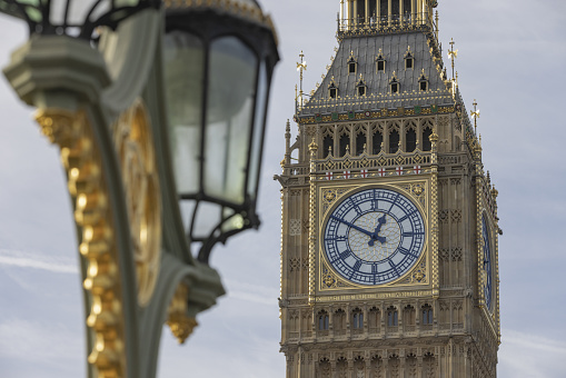 detail of the Big Ben along the Thames river; London, United Kingdom
