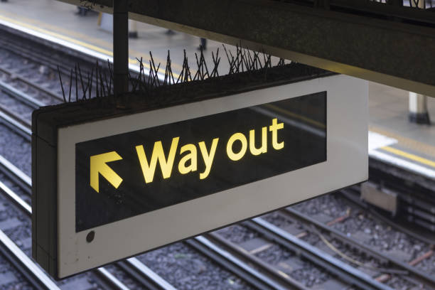 way out sign in the london underground - way out sign imagens e fotografias de stock