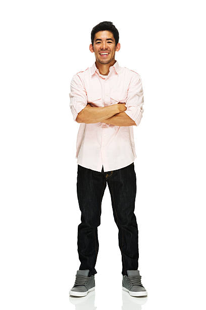 istock Smiling man standing with arms crossed 179474213
