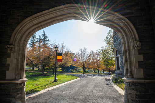 Glenside, USA - November 5, 2023. Arched door at Grey Towers Castle  in the campus of Arcadia University, a private university located in Glenside, Cheltenham township, Pennsylvania, USA
