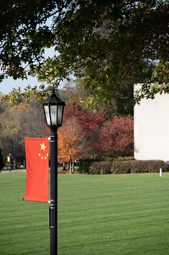 Glenside, USA - November 5, 2023. National flag of China in the campus of Arcadia University, a private university located in Glenside, Cheltenham township, Pennsylvania, USA