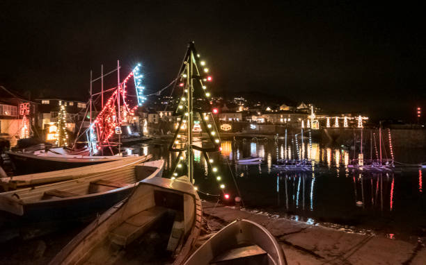 istock Christmas lights and boats in harbour 1794757735