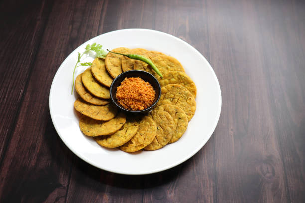 istock Crispy and crunchy methi mathri is a popular tea time snack in north India. It's especially popular during the Diwali festive season. It's a savory cracker or Masala puri. Copy Space. 1794777260