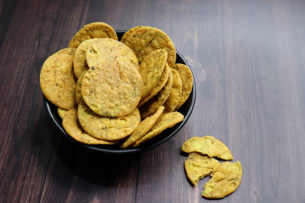 istock Crispy and crunchy methi mathri is a popular tea time snack in north India. It's especially popular during the Diwali festive season. It's a savory cracker or Masala puri. Copy Space. 1794777265