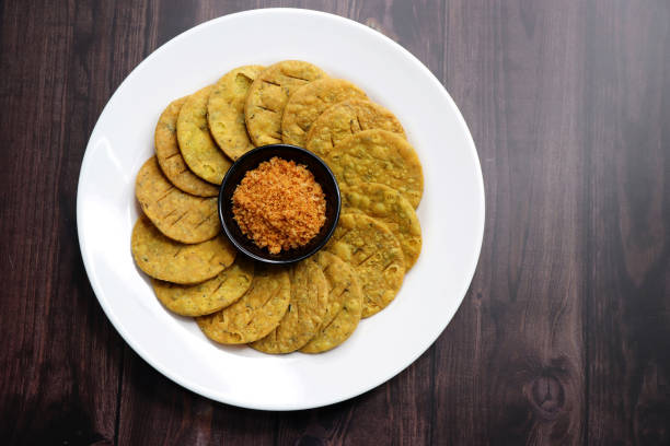 istock Crispy and crunchy methi mathri is a popular tea time snack in north India. It's especially popular during the Diwali festive season. It's a savory cracker or Masala puri. Copy Space. 1794777266