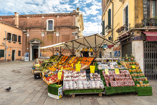 Venice, Italy - March 2, 2023: Stand at the marketplace in historic centre.