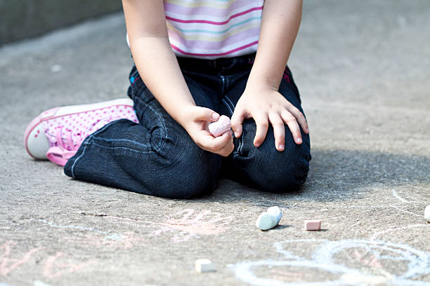 istock Girl writing with chalk 179477942