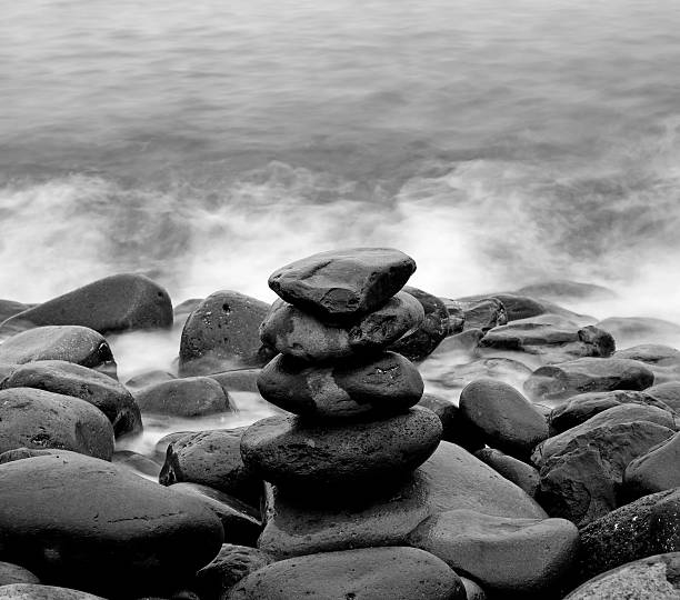 istock Pile of round smooth stones on seashore 179478786