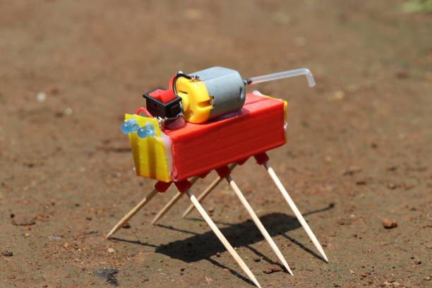 istock DIY robot that was made using 3d printed parts and simple electronics like dc motor and LED. Educational robots 1794811753