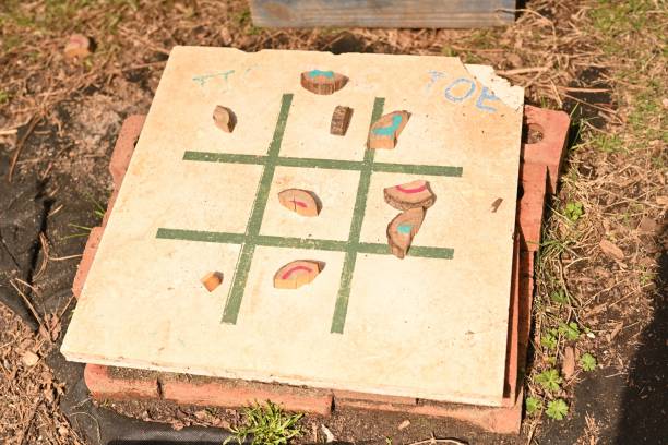 istock Colorful tic tac toe board game in a cardboard box 1794820689