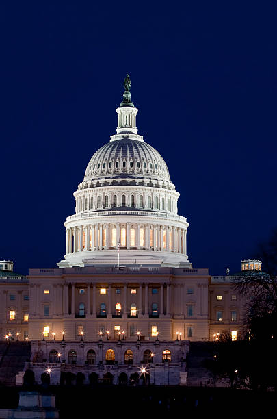 istock The United States Capitol at night 179484894