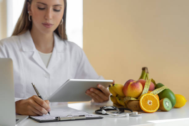 istock Nutritionist uses a digital tablet 1794855743