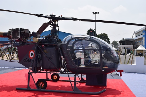 Bangalore, India – February 04, 2021: A helicopter parked at the Yelahanka airbase in Bengaluru, Karnataka, India