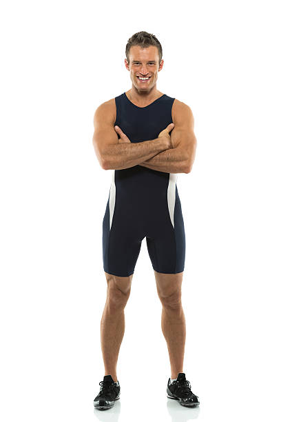 istock Male athlete standing with his arms crossed 179487761
