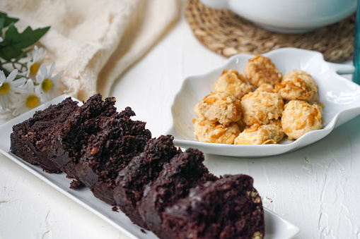 Chocolate Moist Cake & Cornflakes Cookies on a table.  Selective focus.