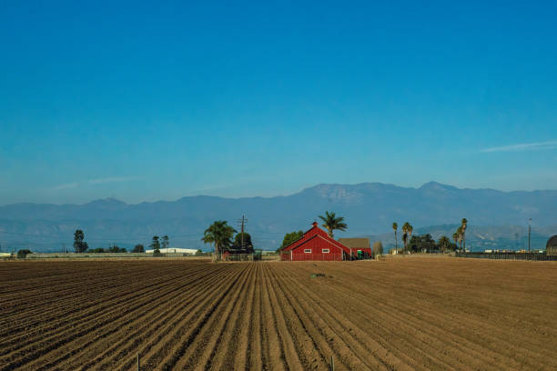 Red Bar around Agricultural Fields and Mountains in the background South of Oxnard, California