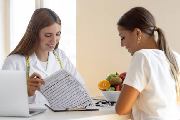 Female doctor explaining a nutritional facts
