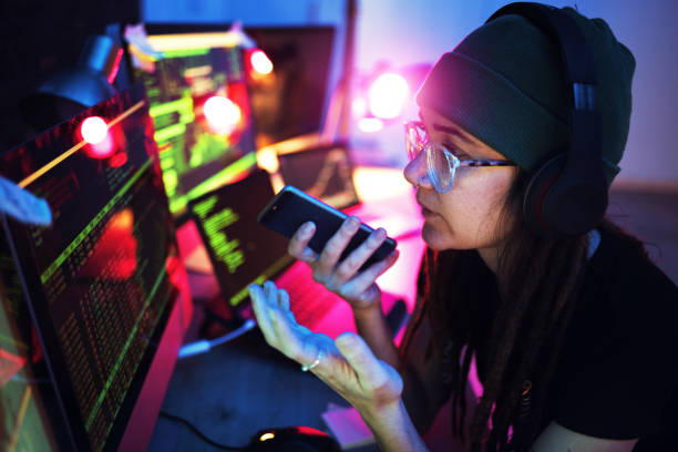 istock Computer screen, phone call or girl hacker in basement in dark room at night for hacking, phishing or cybersecurity. Voice note, woman or code for hacking, digital transformation or networking online 1794918046