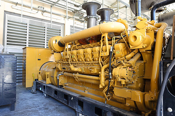 Brightly painted yellow diesel generator stock photo