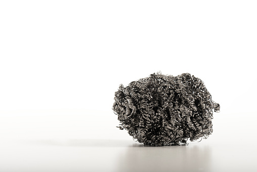 Metal scourer for clean on white background.
