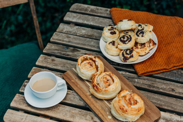 istock French cookies and cup of coffee on brown tablecloth on a table 1794991094