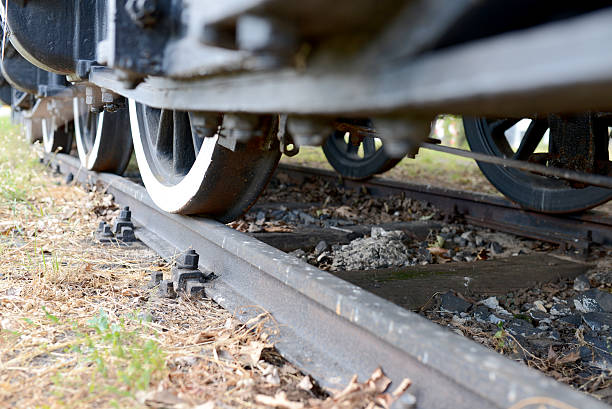 istock Closeup of old steam train on rails 179499111