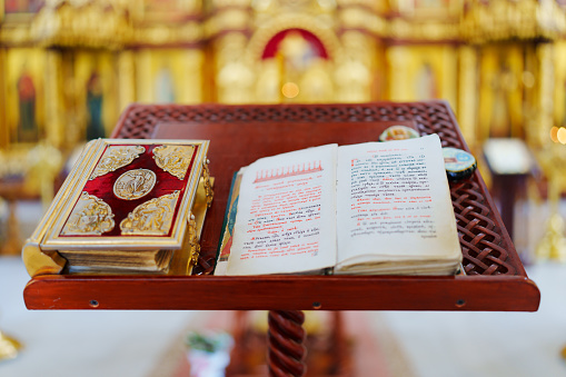 A Bible on a table for church ceremonies.