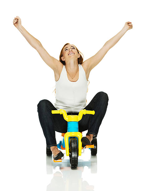 istock Young woman sitting on tricycle 179500213
