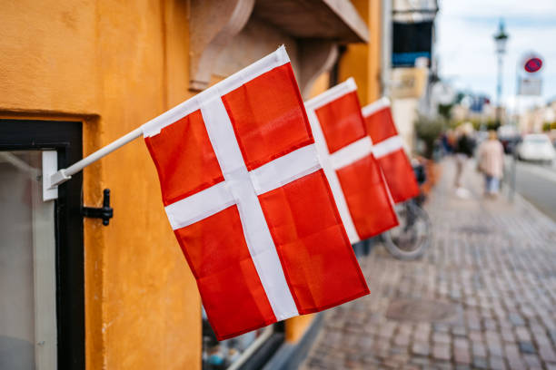 istock Danish Flag On The Building In Copenhagen In Denmark 1795005080