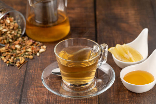 istock Freshly brewed hot winter tea on a wooden table 1795007418