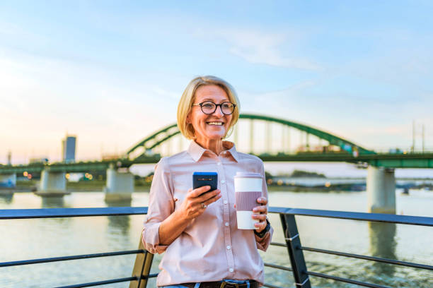 istock Mature woman enjoy by the riverside 1795011293