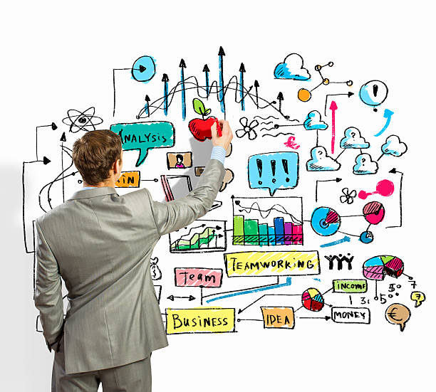 istock Businessman drawing sketches on wall 179503722