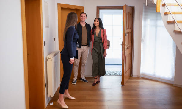 istock Estate Agent Talking With Potential Buyers 1795043332