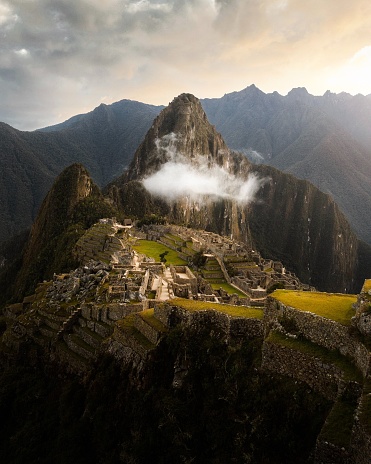 Aerial shot of a stunning mountainous landscape with snow-capped peaks of Machupicchu Inca, Peru